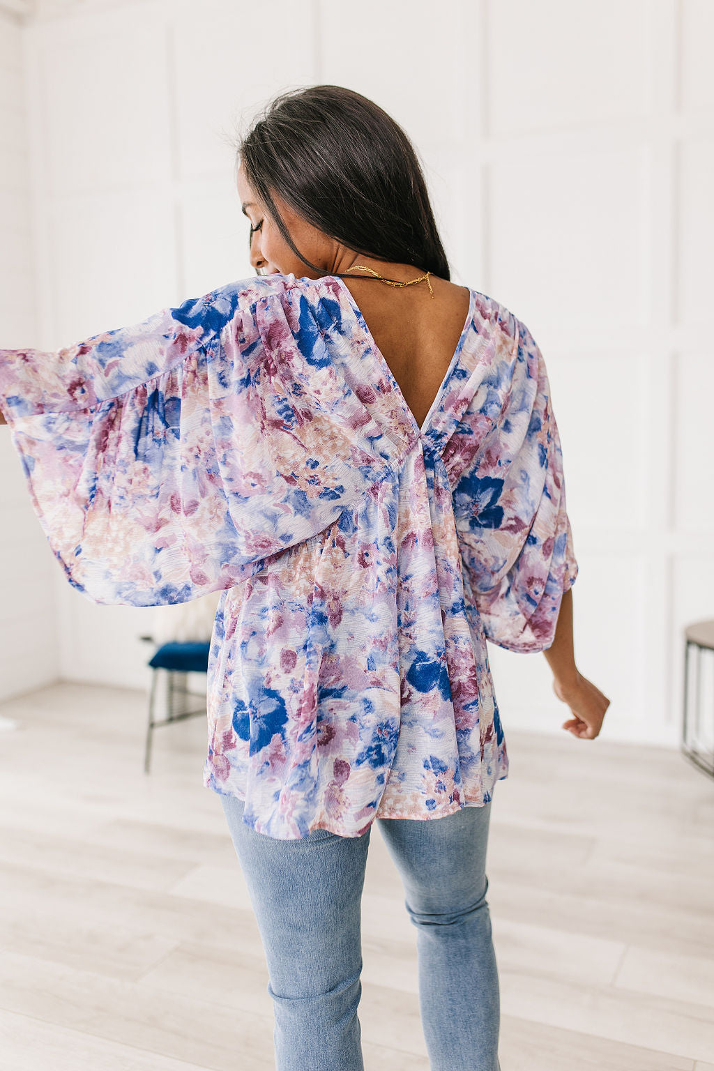 Fabled in Floral Draped Peplum Top in Blue